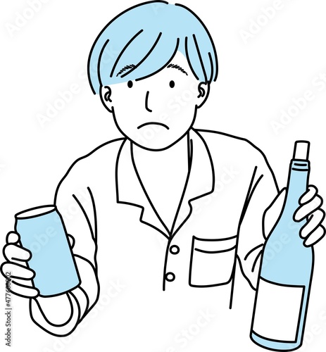 ワインボトルと缶を持つ困った顔の若い男性