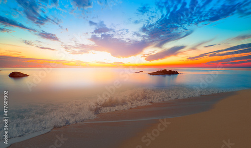Fototapeta Naklejka Na Ścianę i Meble -  sea waves and bubbles on the beach with amazing sunset over the sea - Alanya, 