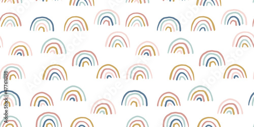 Hand-drawn rainbow pattern. Cute boho, abstract rainbow doodle. Seamless vector baby pattern in muted colors.
