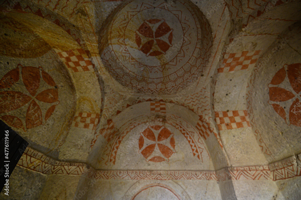 Frescos and murals in ancient cave church in Goreme, Cappadocia, Turkey painted in directly onto rock