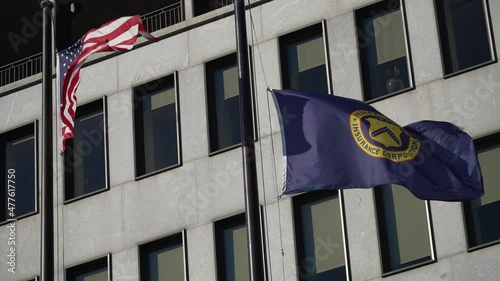 Flags in front of Federal Deposit Insurance Corporation building in Washington, DC. photo
