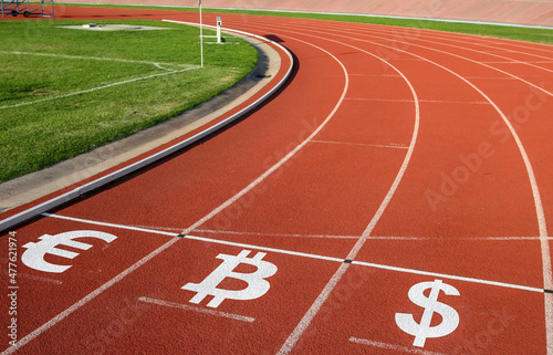 Running track on a stadium with Bitcoin logo