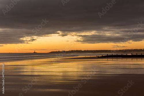 Sunrise to start the day at Blyth beach in Northumberland  with St Mary s Lighthouse in the distance