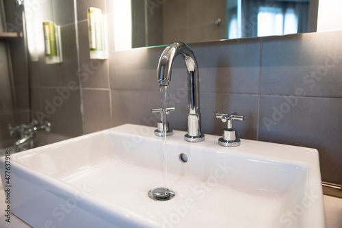 faucet of a sink in modern bathroom for interior design