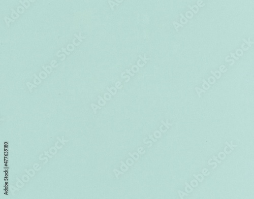 light teal green paperboard surface background