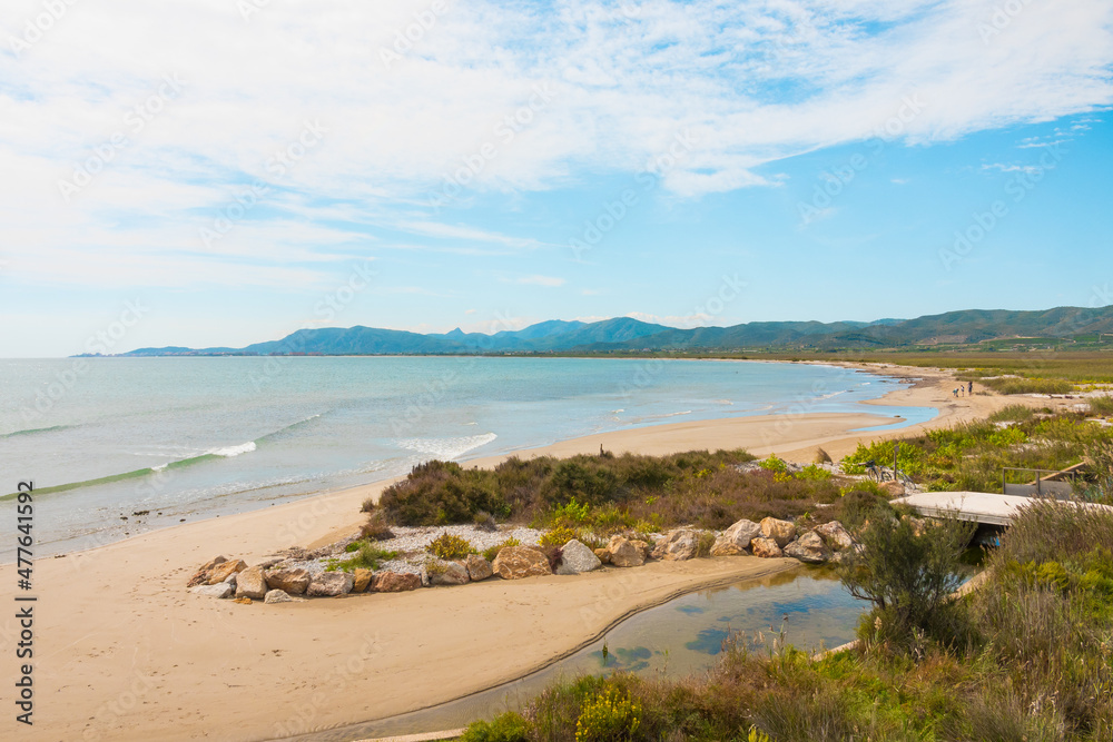Beautiful coastline of Costa Azahar (Orange tree Coast) in the Valencian Community with ocean, beach and mountains in Spain.