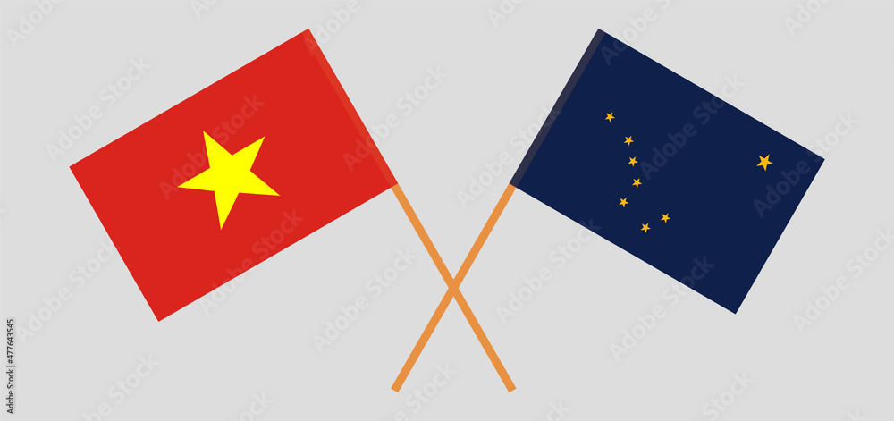 Crossed flags of Vietnam and the State of Alaska. Official colors. Correct proportion Crossed flags of Vietnam and the State of Alaska. Official colors. Correct proportion