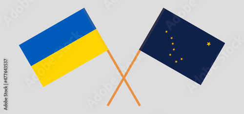 Crossed flags of Ukraine and the State of Alaska. Official colors. Correct proportion
