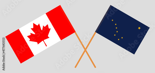 Crossed flags of Canada and the State of Alaska. Official colors. Correct proportion