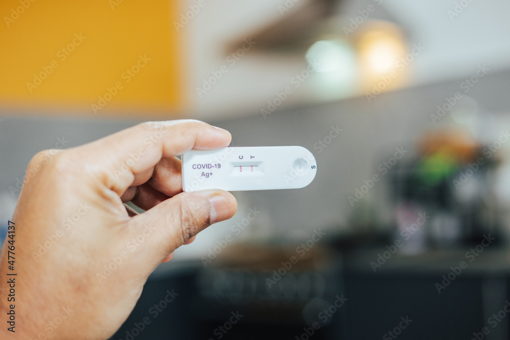 positive selftest result for covid 19 at home Stock Photo Adobe Stock