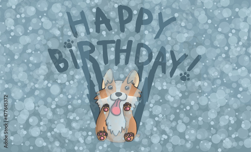 A cheerful cute dog congratulating on his birthday with the help of snow-covered windows.