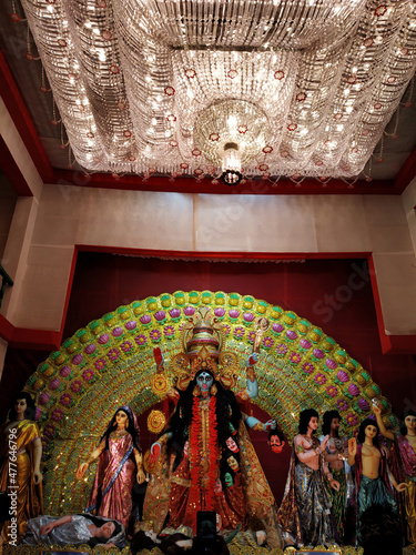 Kali Puja is also known as Shyama Puja or Mahanisha Puja. It is a festival celebrated in the honor of Hindu goddess Kali. It is celebrated on the new moon day of the Hindu month Kartik. photo