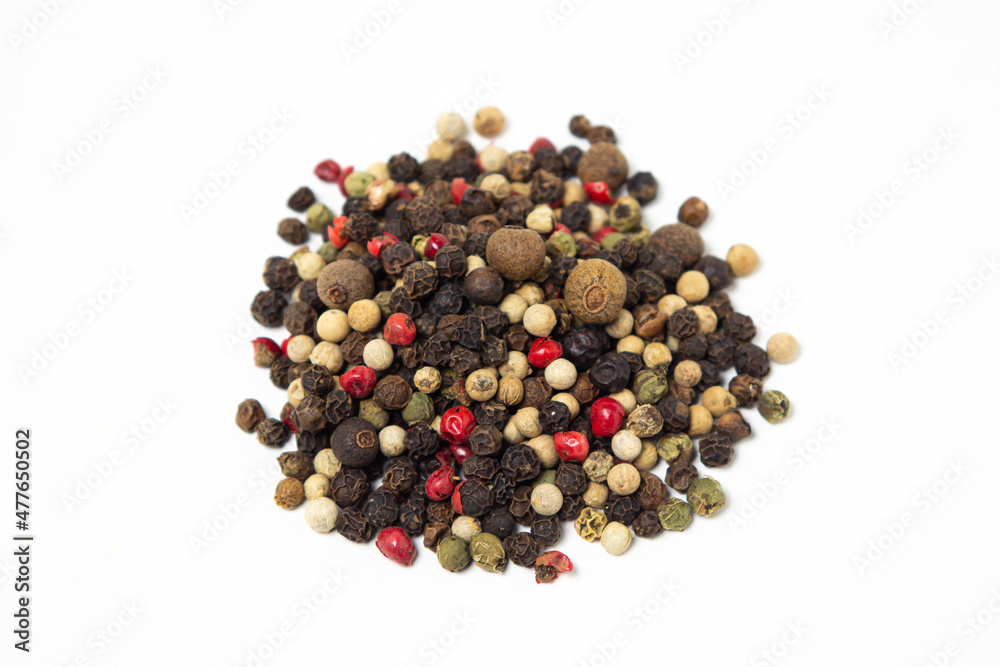 Mix of peppers on a white background. Peppers mix isolated. Peppercorns Mix of peppers on a white background. Peppers mix isolated. Peppercorns