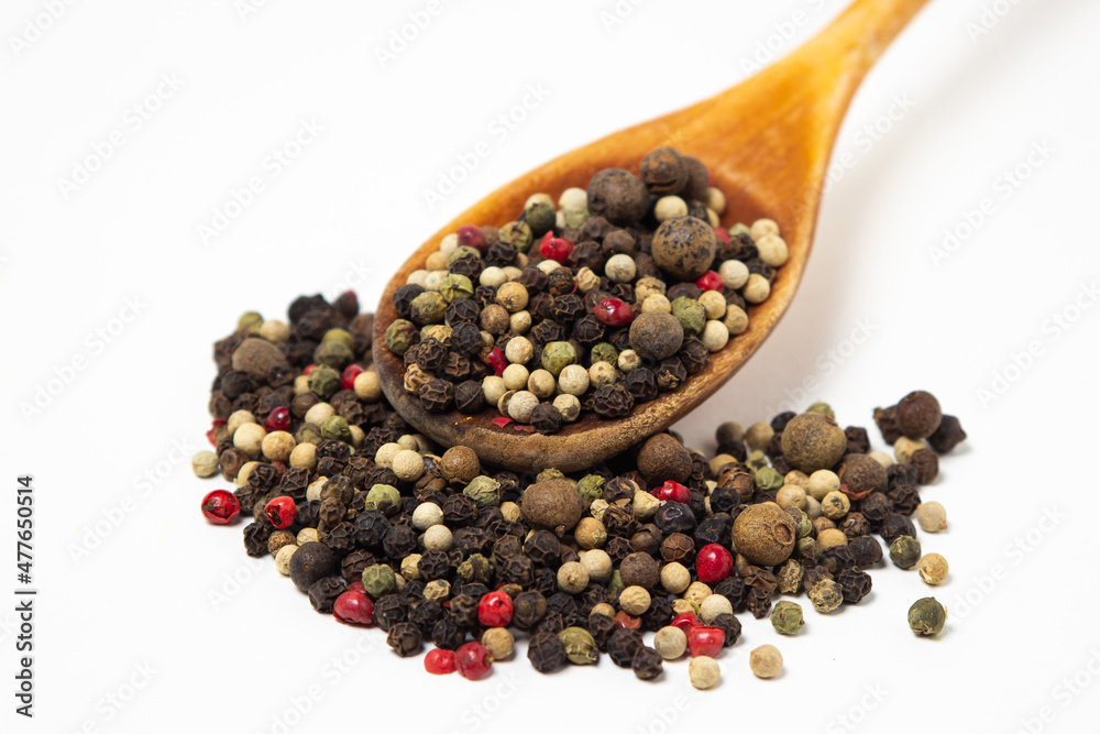 Mix of peppers on a white background. Peppers mix isolated. Peppercorns Mix of peppers on a white background. Peppers mix isolated. Peppercorns