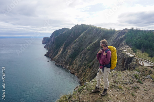 Hiker on the cliff of the Olkhon island