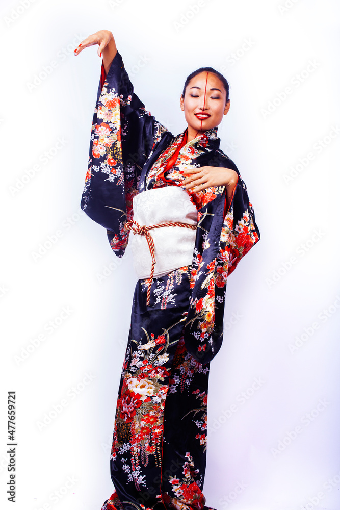 young pretty geisha in black kimono posing isolated on white background, asian ethno young pretty geisha in black kimono posing isolated on white background, asian ethno