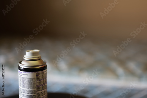 Selective focus on insect insecticide aerosol can fogger used to kill bed bugs, spiders, mites, flies, and fleas photo