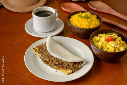 Sun meat tapioca and curd cheese, with eggs and couscous. Typical Brazilian Northeast breakfast.