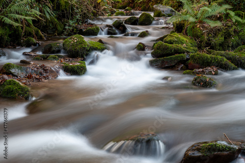 Long exposure of a waterfall on the river Horner in Horner woods in Somerset