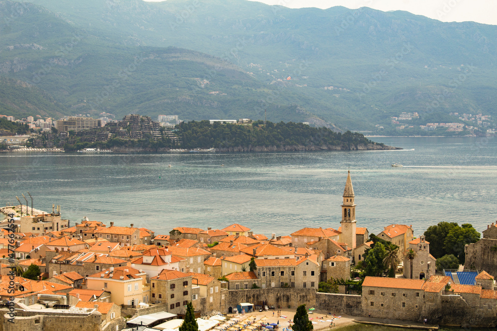Panoramic view of the city, sea and bay on the sunny day. Budva. Montenegro.