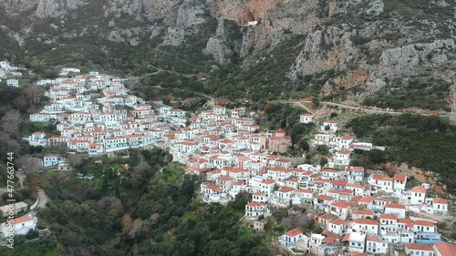 Panoramic view of the Historical Byzantine village Velanidia near cape Malea, Greece. In the Cave above the village is visible the Holy Monastery of Zoodochos Pighi. Laconia Peloponnese, Greece photo
