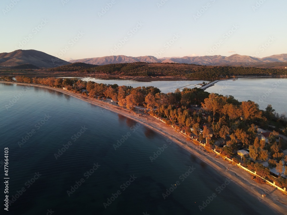 Aerial View Of Drepanos Beach At Golden Hour Sunset Evening Tourist Destination In Igoumenitsa City, Epirus, Greece