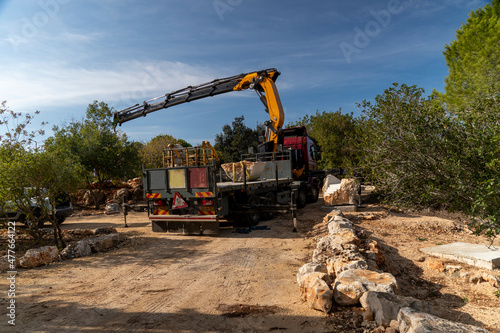 A crane brought stone blocks to the site