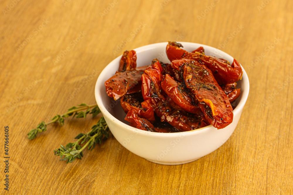 Sun-dried natural Italian tomato in the bowl Sun-dried natural Italian tomato in the bowl