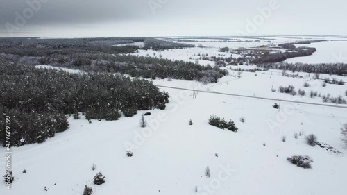 snow - covered fields . snow-covered nature from the air