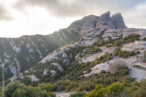 Picturesque landscape with mountains. Landscape and beautiful sunset on Montserrat mountain. Rock formations and cliffs in the Catalan Natural Park of Montserrat. Barcelona, Catalonia, Spain