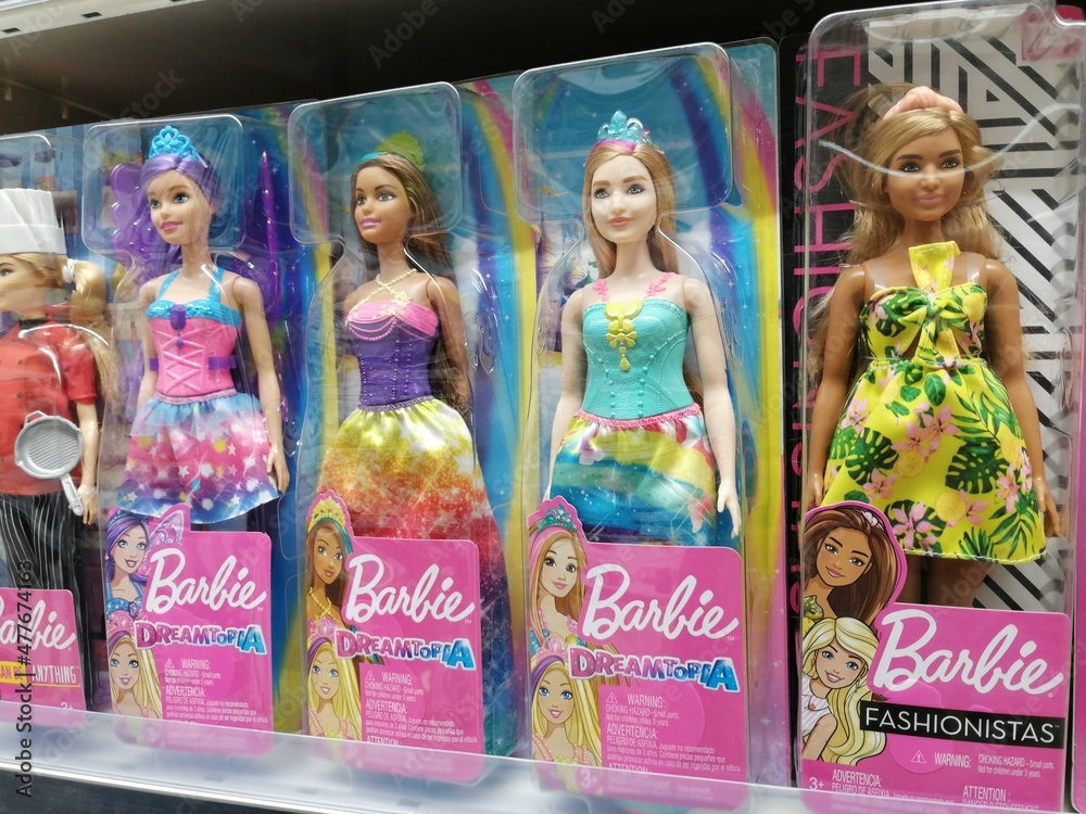 Barbie dolls for sale on shelves in a supermarket Stock Photo | Adobe Stock