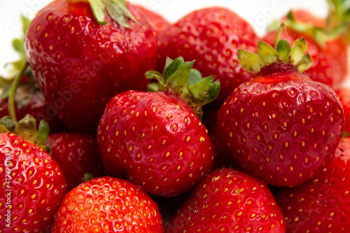 Fresh ripe strawberries. Close-up. Strawberry harvest. White background.