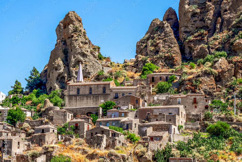 Small village of Pentedattilo, church and ruins of the abandoned village, Greek colony on Mount Calvario, whose form recalls the five fingers. Calabria, Italy