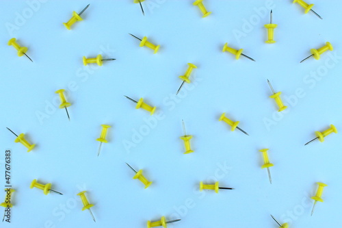 yellow push pins as a background