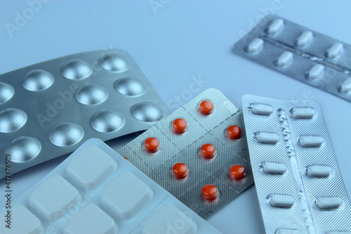 packs of pills isolated on white