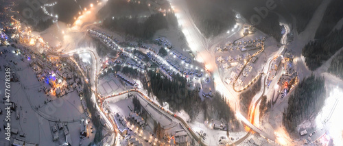 Fototapeta Naklejka Na Ścianę i Meble -  Flight over the ski resort at night