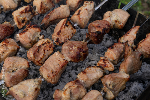 Appetizing pieces of barbecue, cooking meat on the grill