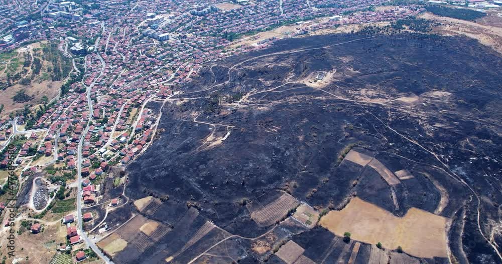 Aerial view of aftermath destruction in city of an fire explosion, bushfire, war Aerial view of aftermath destruction in city of an fire explosion, bushfire, war