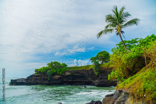 Panorama beach and cliffs in Tanah Lot temple, Bali, Indonesia.