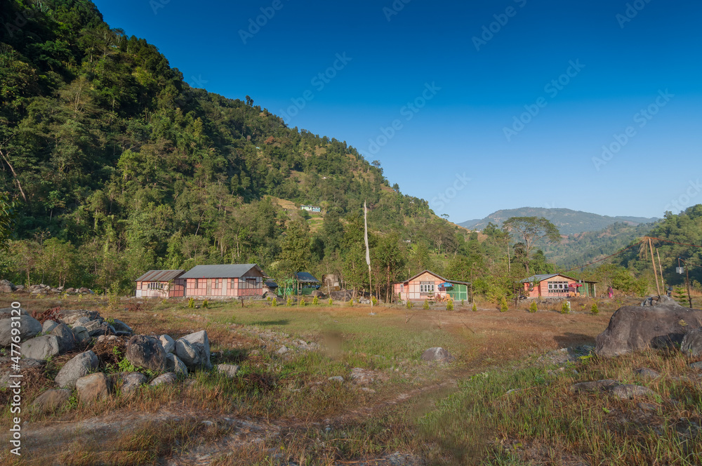 Reshikhola village, Himalayan mountain range in the background . Reshikhola is a remote village with breathtaking scenic natural vista of world famous Himalayas in background, in Sikkim, India.