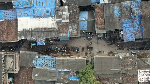 dharavi india bigest slum drone shot early morning covid 19 top shot birds eye view  revile shot going up . photo