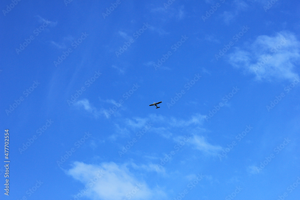 Small plane in the blue sky. Small plane in the blue sky.