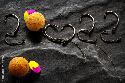 New Year 2022. Fishing hooks and boilie rig