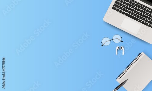 Minimal workspace creative flat lay design of Workspace desktop view office desk with laptop, smartphone, books, eyeglass and earphones on blue color Background. Vector EPS 10
