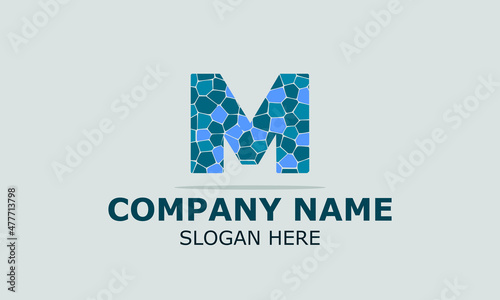 Abstract vector logo letter m with blue stones in gray background . modern logo design template.