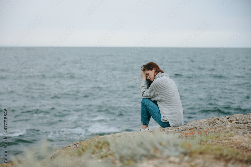 woman long hair nature rocks coast landscape unaltered