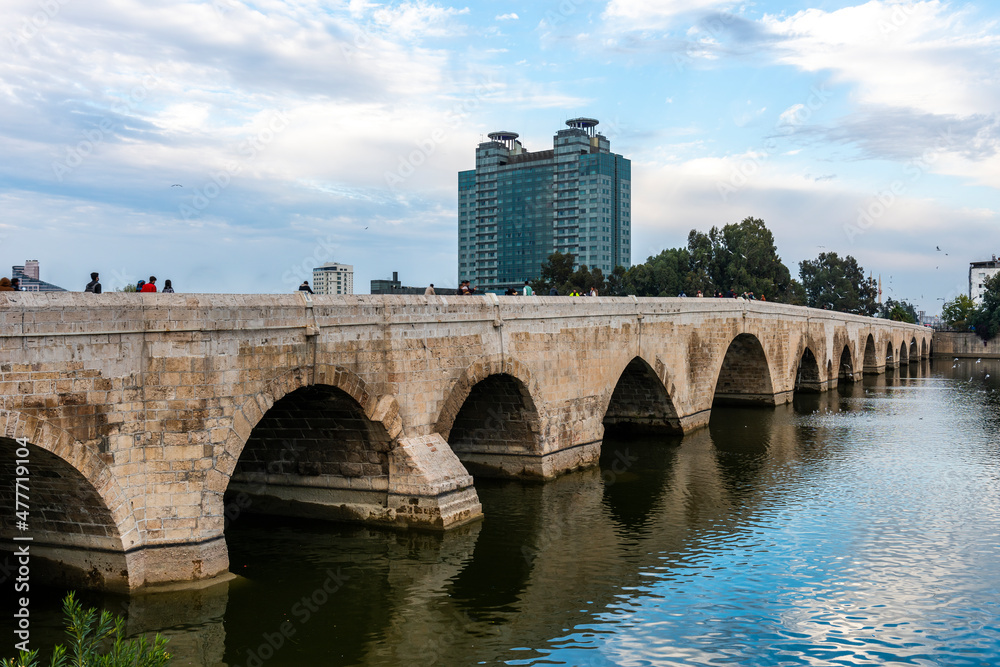 Fototapeta premium TASKOPRU in ADANA, TURKEY. Historical stone bridge on the Seyhan River. (English: Stone Bridge). 