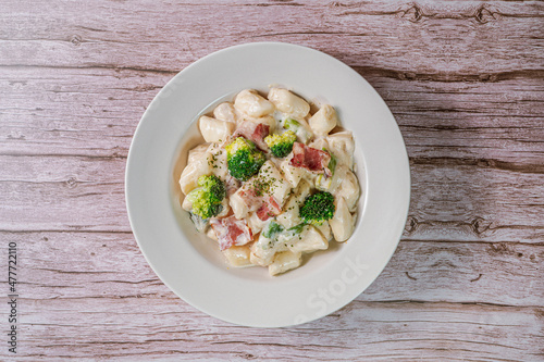 Korean food Spicy Stir-fried Carbonara tteokbokki dish on white plate