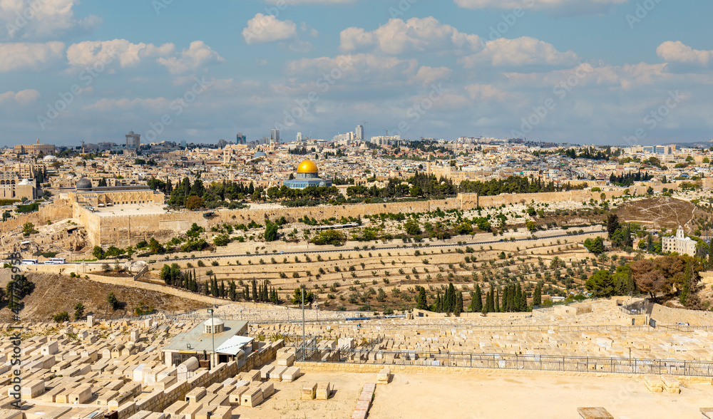 Metropolitan Jerusalem panorama with Temple Mount and Old City with historic Jewish cemetery on slope of Mount of Olives in Israel