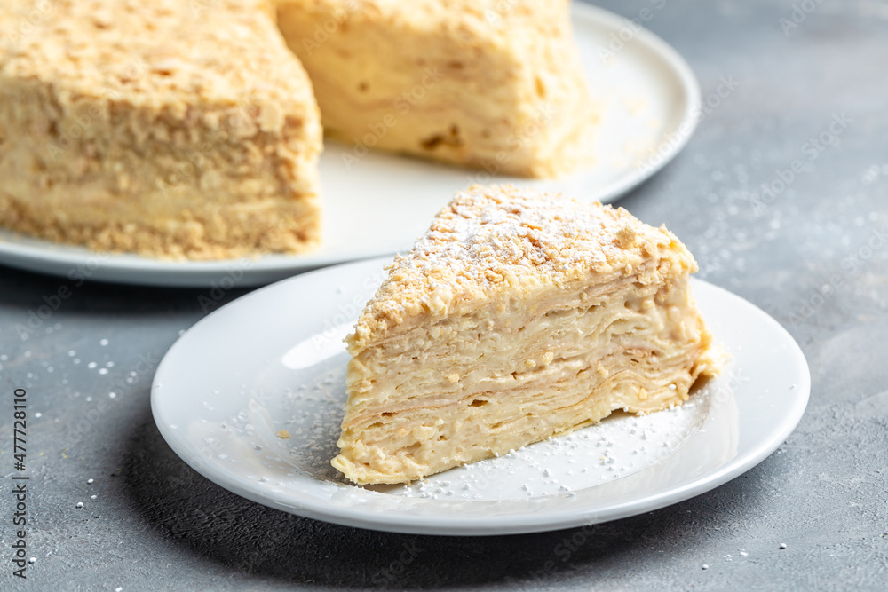 Classic Napoleon multi layered cake with pastry cream, Traditional French dessert Classic Napoleon multi layered cake with pastry cream, Traditional French dessert